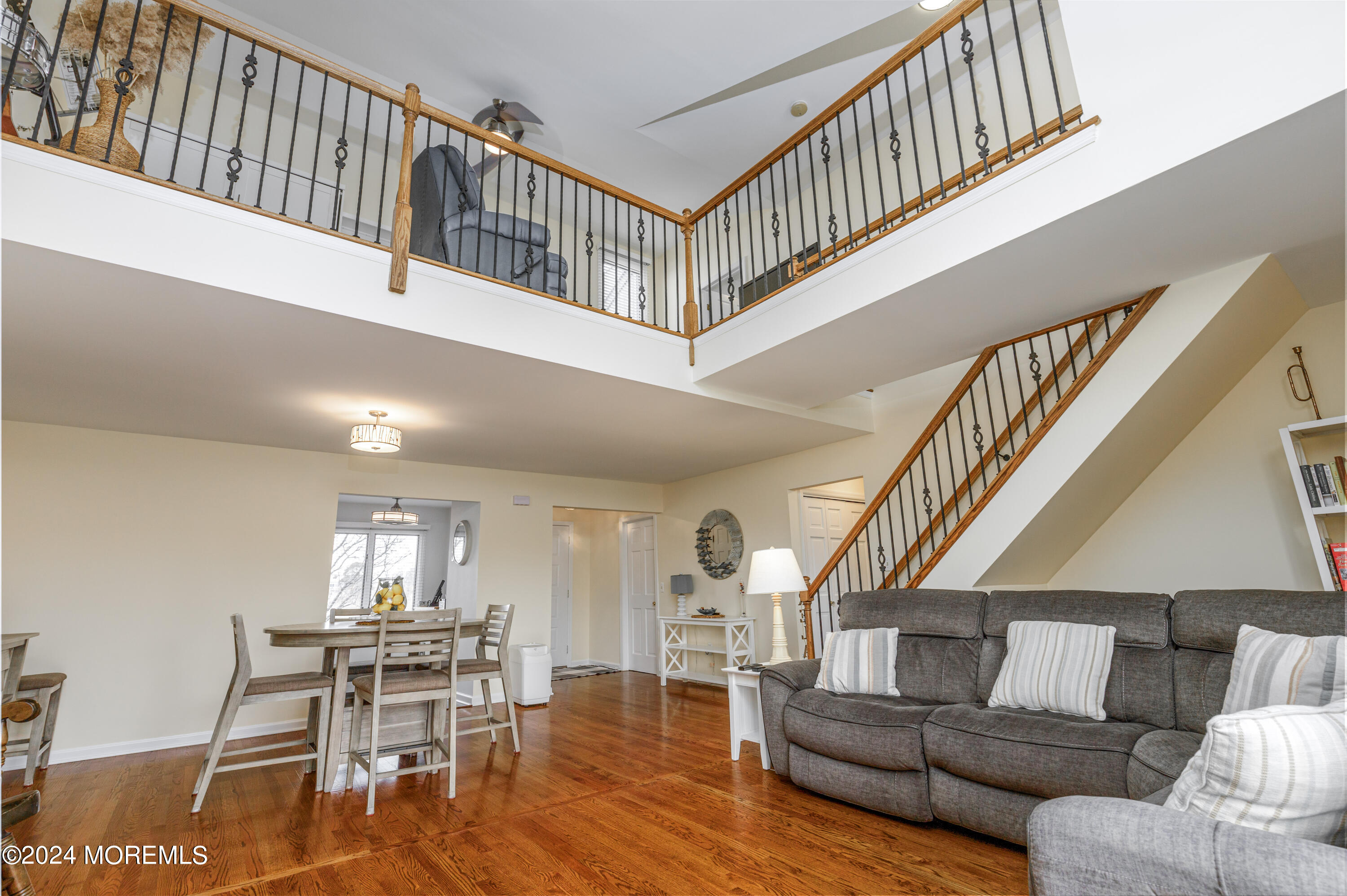 2 Sea Point Drive Point Pleasant, NJ 08742 - Photo 12 of 37 a living room with furniture and stairs
