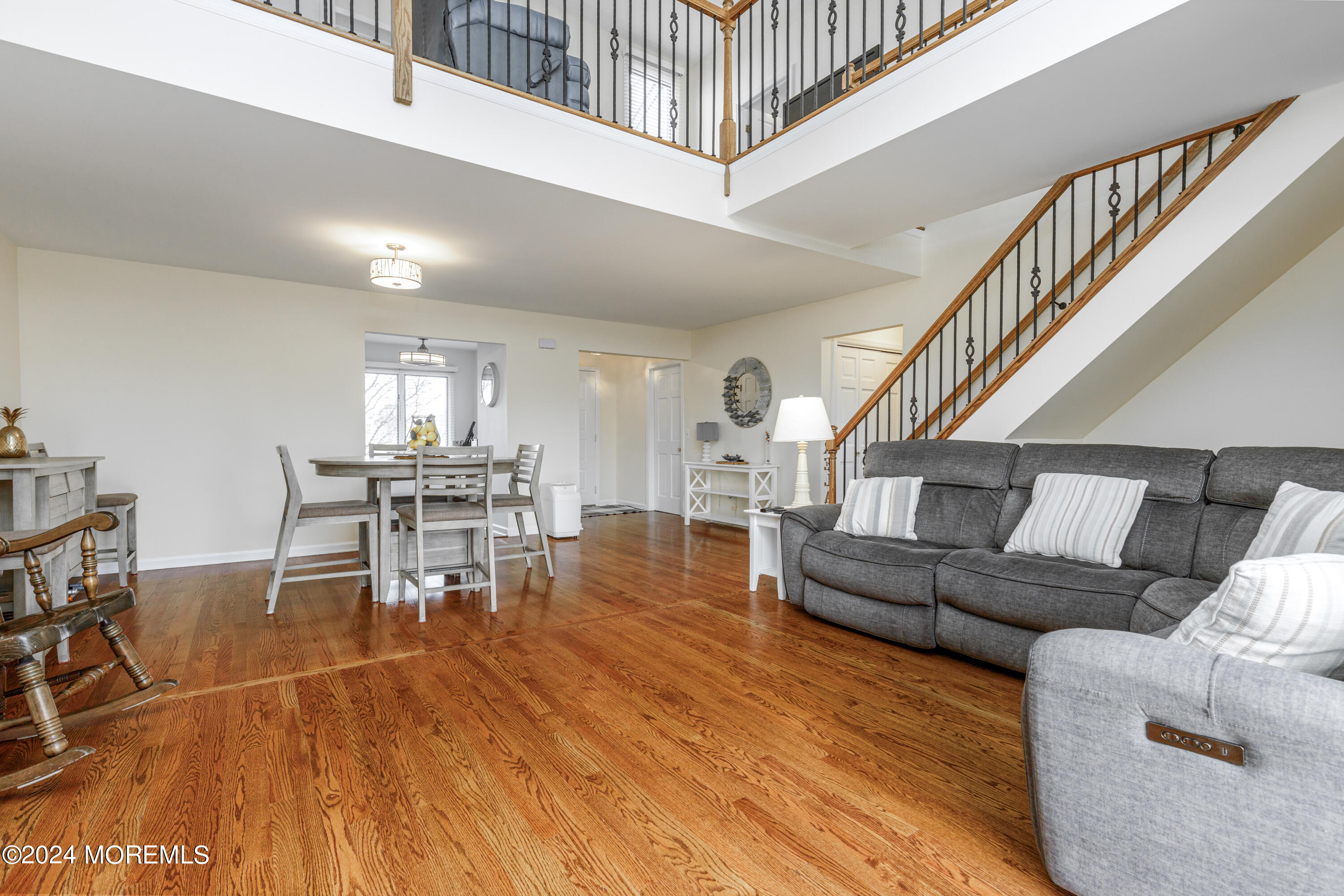 2 Sea Point Drive Point Pleasant, NJ 08742 - Photo 13 of 37 a living room with furniture and a dining table