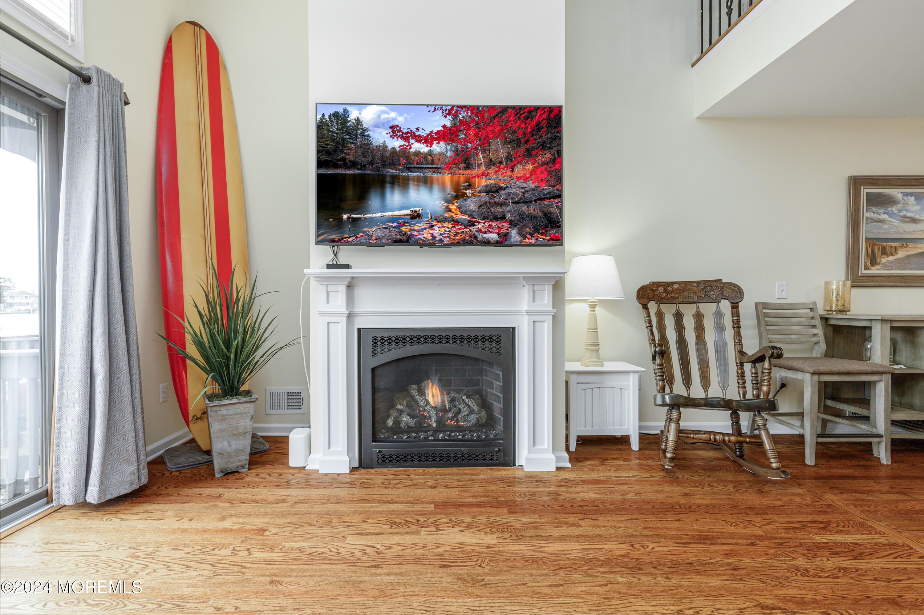 2 Sea Point Drive Point Pleasant, NJ 08742 - Photo 14 of 37 a living room with furniture and a fireplace