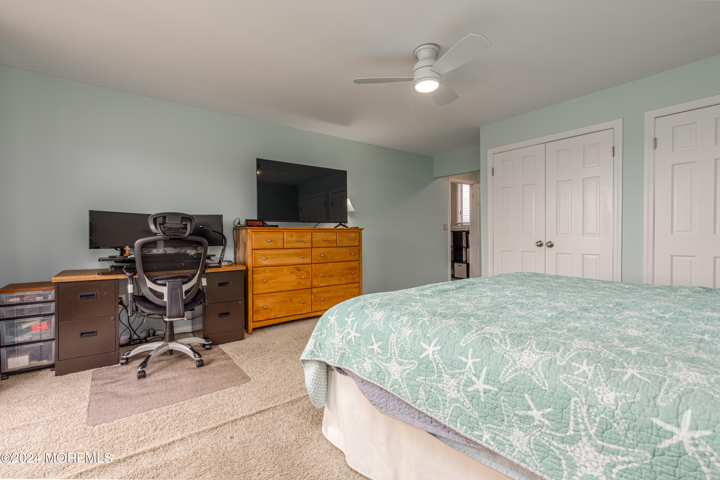 2 Sea Point Drive Point Pleasant, NJ 08742 - Photo 24 of 37 a bedroom with a bed and a flat screen tv