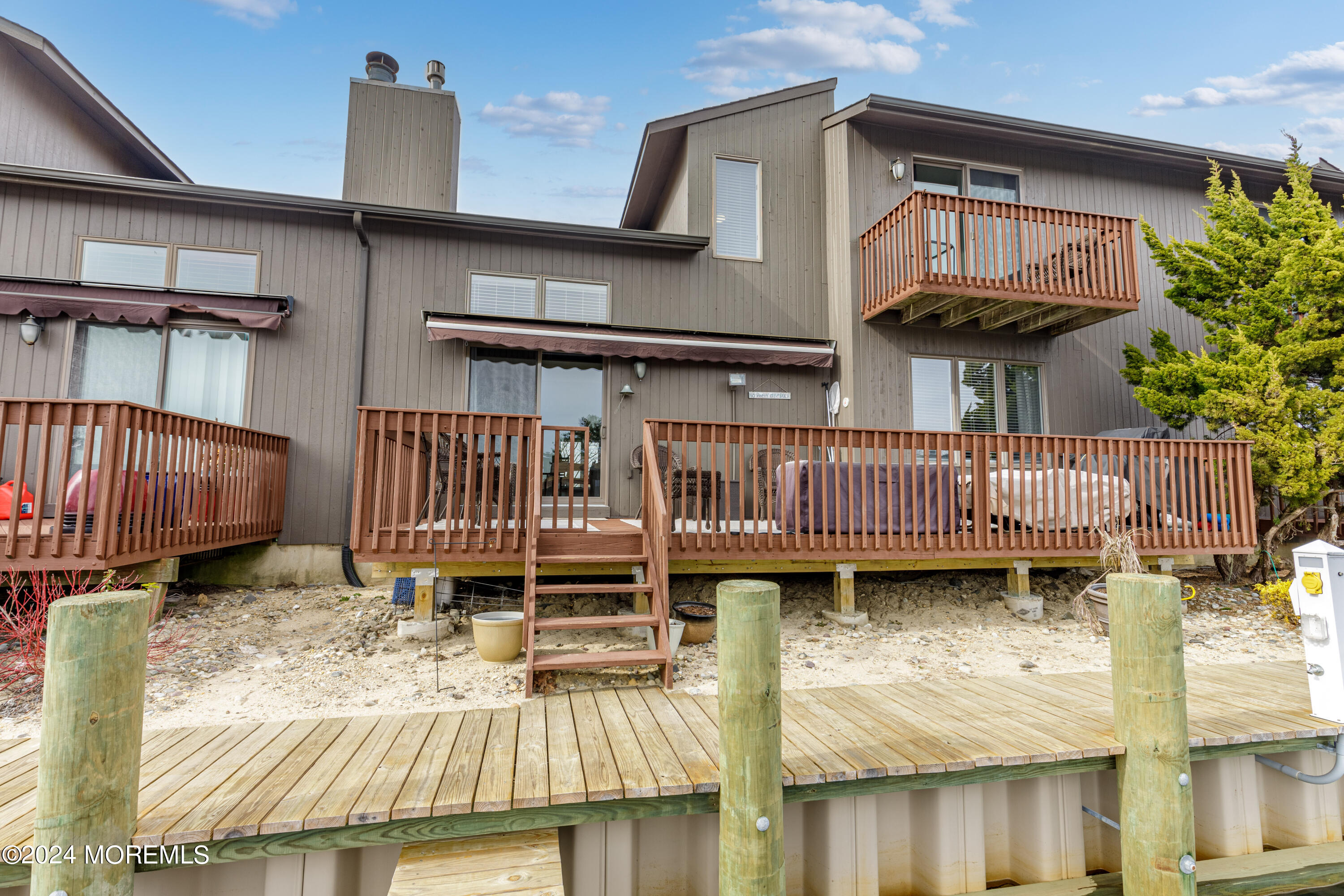 2 Sea Point Drive Point Pleasant, NJ 08742 - Photo 3 of 37 a view of a house with wooden deck