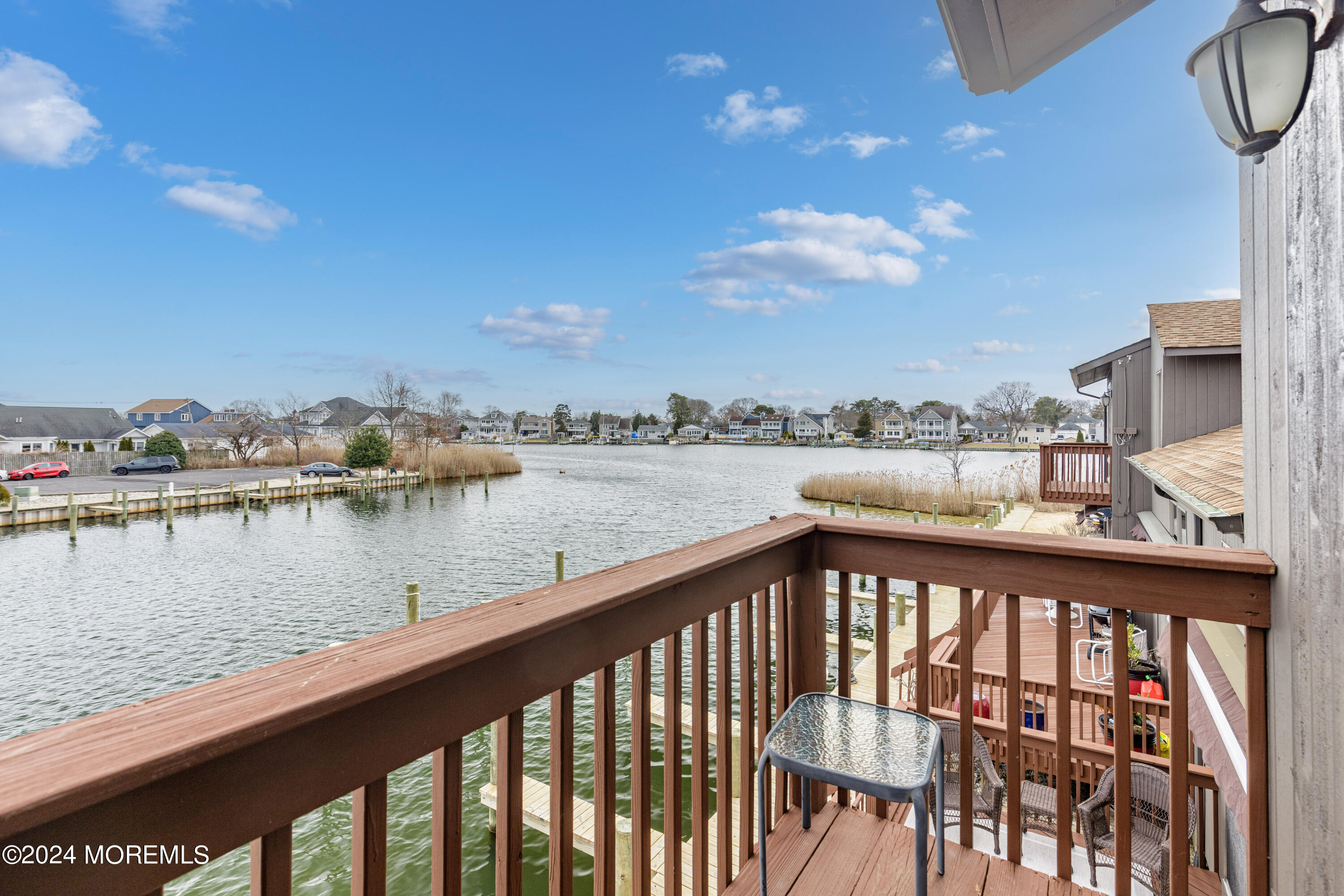2 Sea Point Drive Point Pleasant, NJ 08742 - Photo 5 of 37 a view of a lake from a balcony
