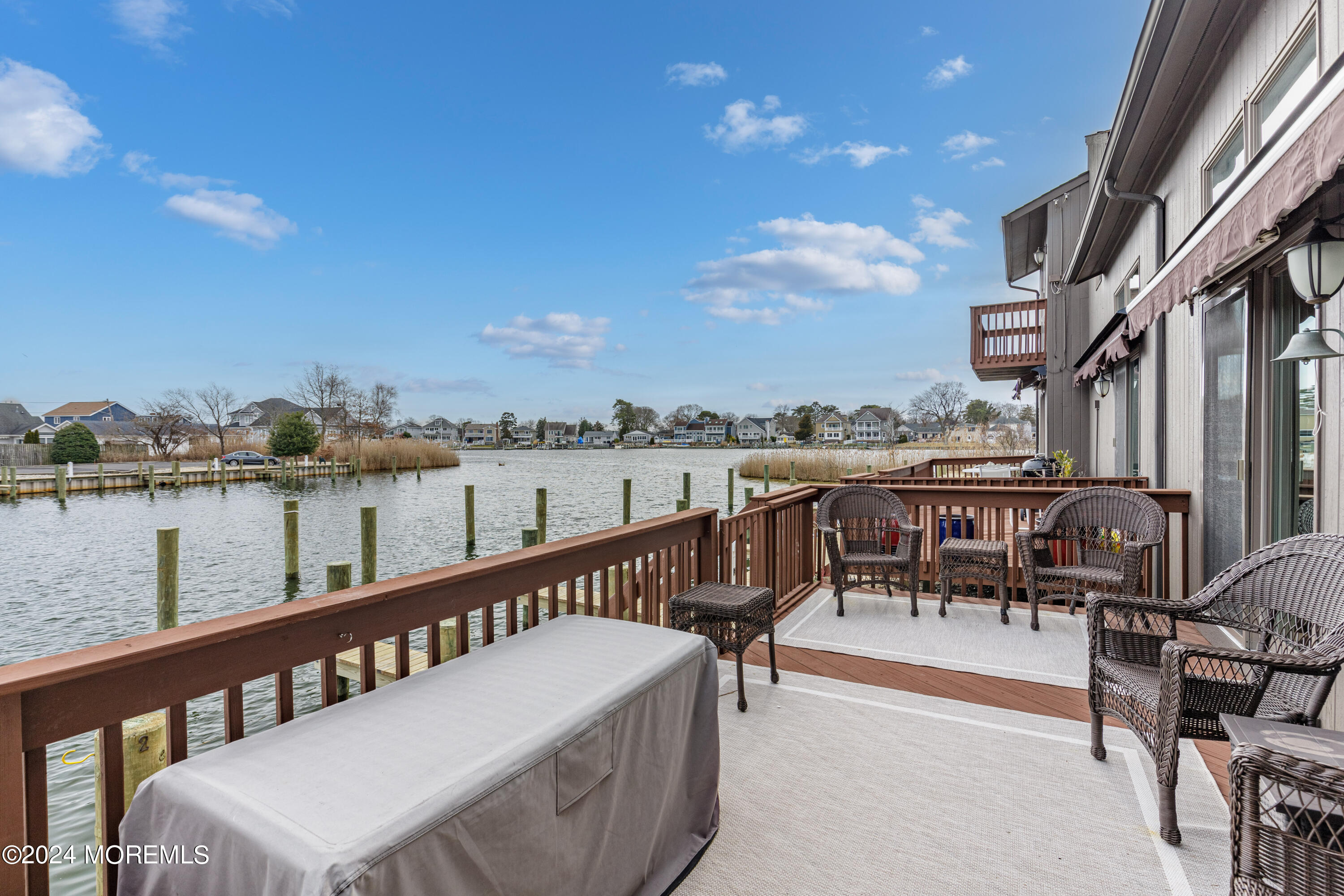 2 Sea Point Drive Point Pleasant, NJ 08742 - Photo 6 of 37 a view of a chairs and tables on the balcony