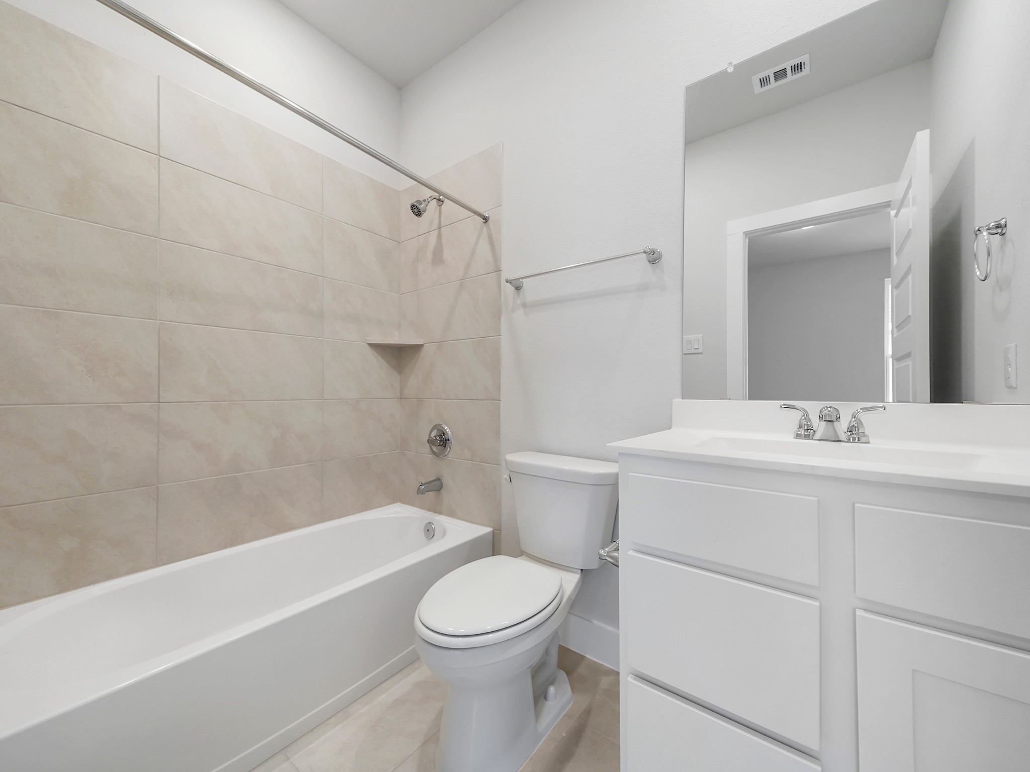 6010 Rolling Strm Court Fulshear, TX 77441 - Photo 18 of 23 Ensuite bathroom offers tub/shower combo and vanity with storage!
