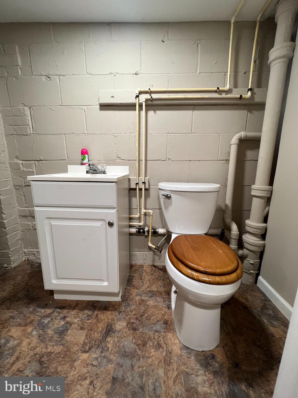 1006 Tunbridge Road Baltimore, MD 21212 - Photo 18 of 19 a bathroom with a sink and a toilet