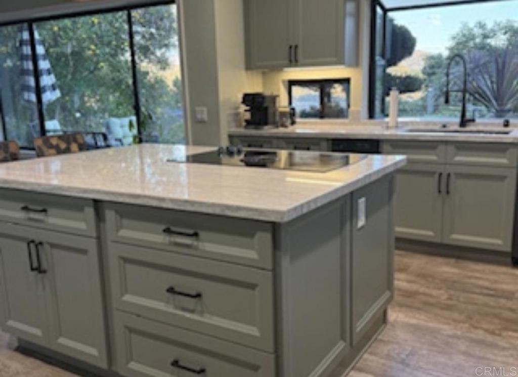 2691 Daisy Lane Fallbrook, CA 92028 - Photo 35 of 70 a kitchen with a sink and cabinets