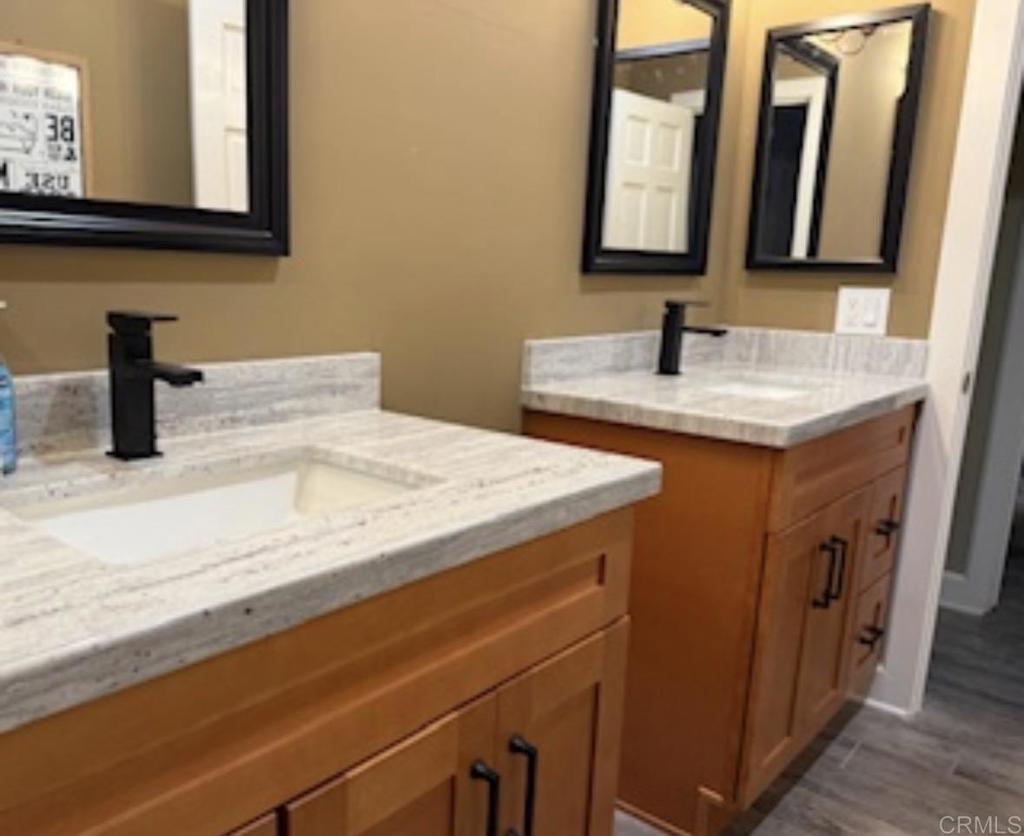 2691 Daisy Lane Fallbrook, CA 92028 - Photo 42 of 70 a bathroom with a sink and a mirror