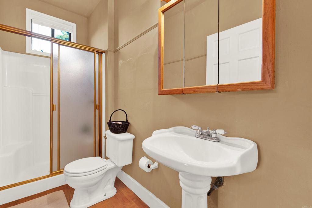 2691 Daisy Lane Fallbrook, CA 92028 - Photo 50 of 70 a bathroom with a sink a toilet and shower