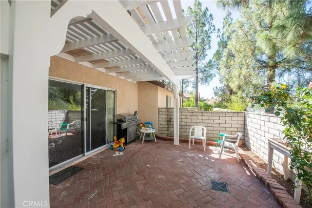 a view of chairs and tables in patio