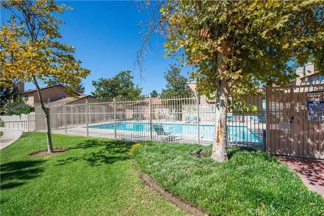 a view of a backyard with a small cabin