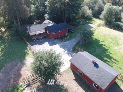 20260 Maxwell Road Southeast Maple Valley, WA 98038 - Photo 25 of 38 a view of a patio in backyard