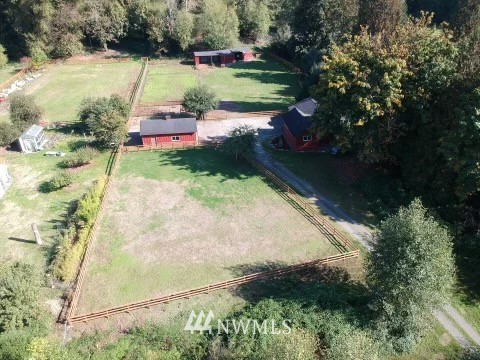 20260 Maxwell Road Southeast Maple Valley, WA 98038 - Photo 26 of 38 a view of a garden with an outdoor space