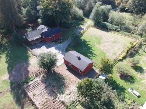 20260 Maxwell Road Southeast Maple Valley, WA 98038 - Photo 27 of 38 an aerial view of a house with a yard