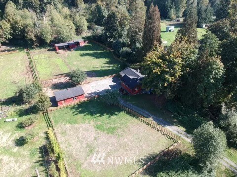 20260 Maxwell Road Southeast Maple Valley, WA 98038 - Photo 29 of 38 a view of a lake with a yard