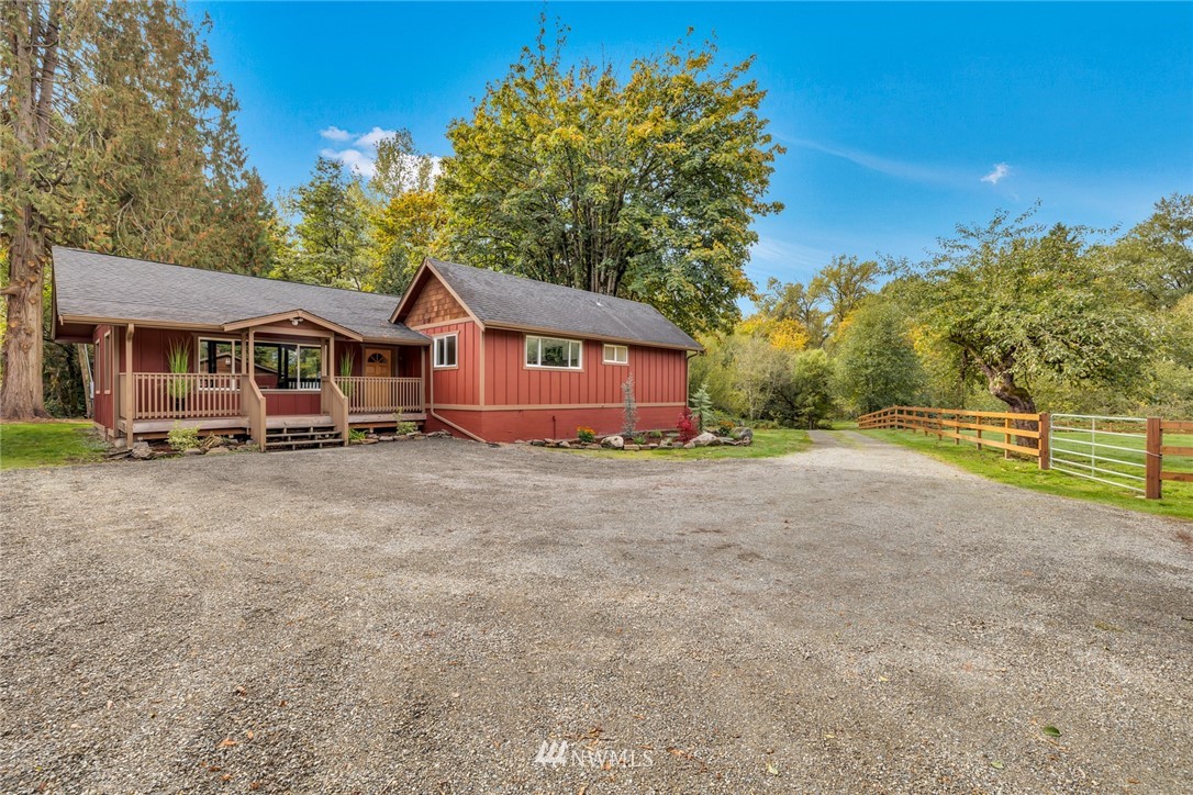 20260 Maxwell Road Southeast Maple Valley, WA 98038 - Photo 38 of 38 a front view of a house with a yard