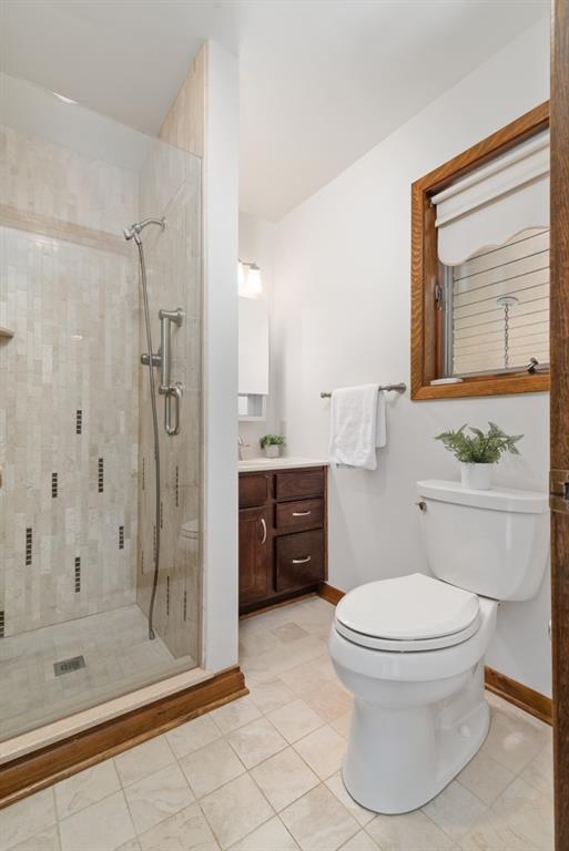 230 Dodds Road Butler, PA 16002 - Photo 21 of 32 a bathroom with a granite countertop toilet sink and shower