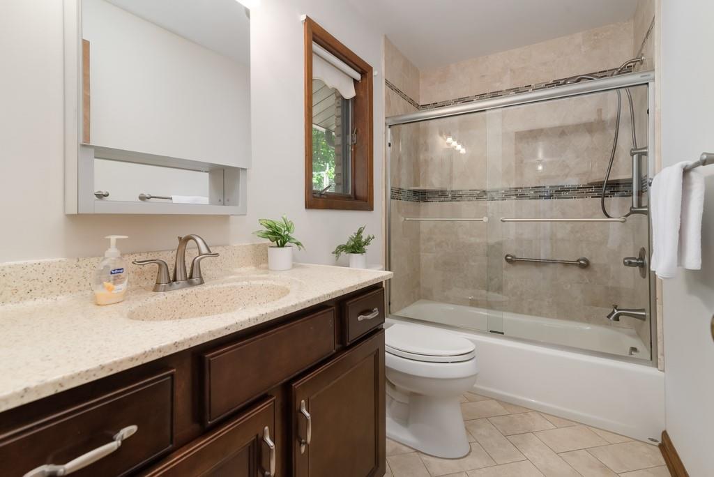 230 Dodds Road Butler, PA 16002 - Photo 24 of 32 a bathroom with a granite countertop sink toilet and shower