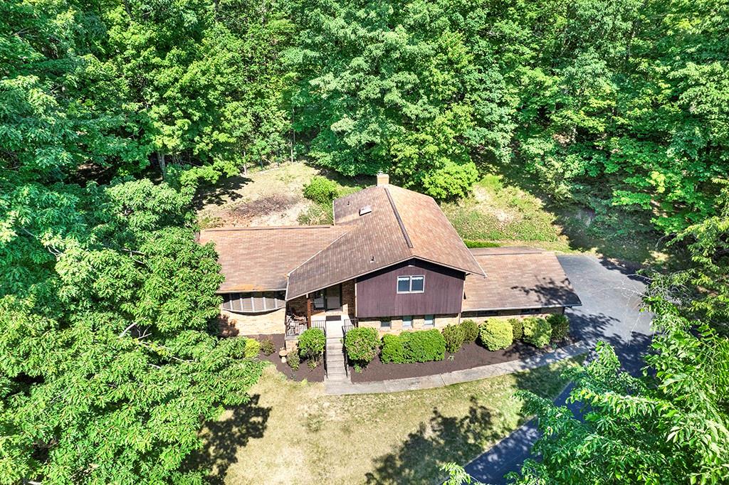 230 Dodds Road Butler, PA 16002 - Photo 32 of 32 an aerial view of a house with a yard and large trees