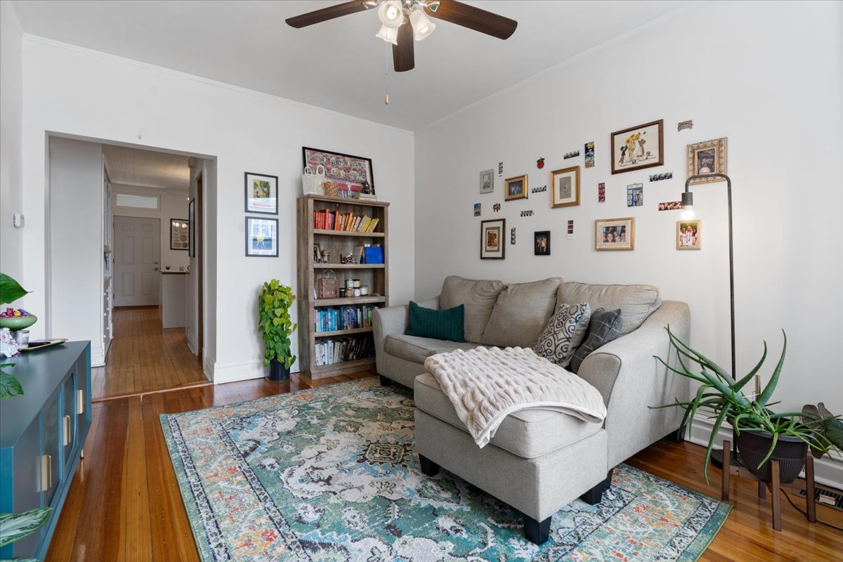 2735 North Ridgeway Avenue Chicago, IL 60647 - Photo 22 of 40 a living room with furniture and a rug
