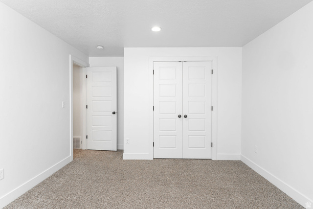 1552 Sumac Drive Logan, UT 84321 - Photo 45 of 72 Neutral tone carpeting complemented by white walls