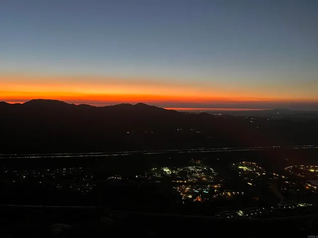 a view of city and mountain