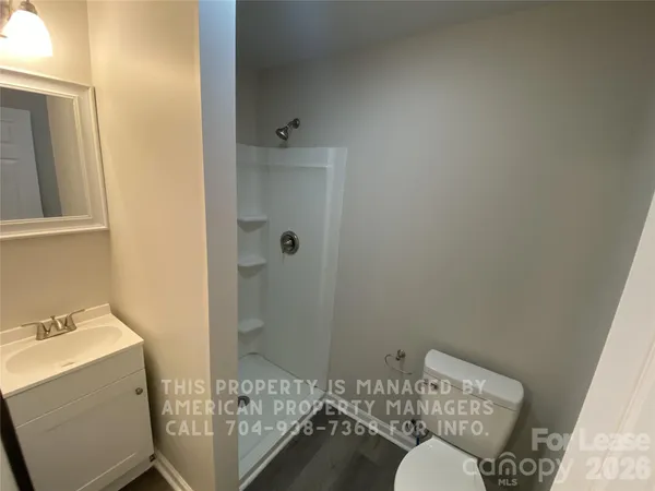 a bathroom with a sink and toilet