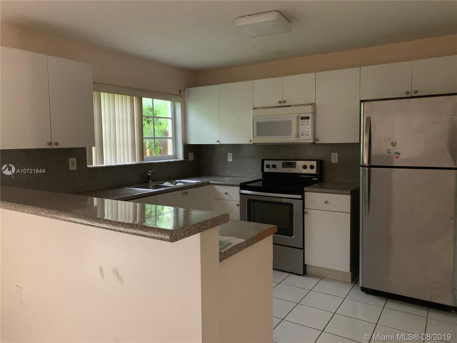 14092 Southwest 260th Street, Unit 104 Homestead, FL 33032 - Photo 2 of 6