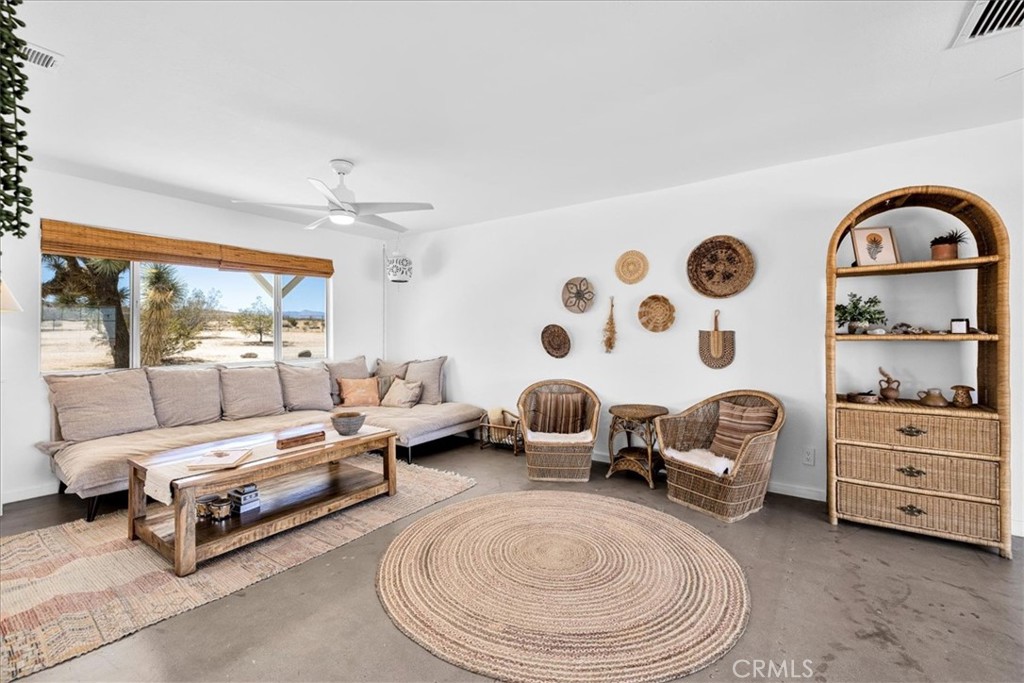 59700 Napa Road Landers, CA 92285 - Photo 11 of 68 a living room with furniture and decor