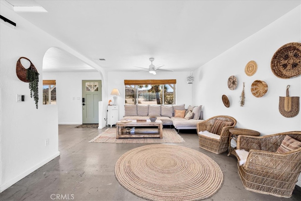 59700 Napa Road Landers, CA 92285 - Photo 12 of 68 a living room with furniture and wooden floor