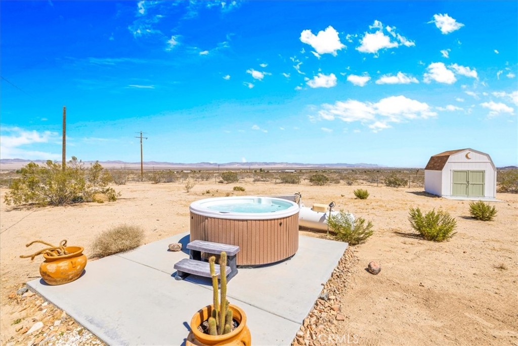 59700 Napa Road Landers, CA 92285 - Photo 37 of 68 a view of a swimming pool and an ocean