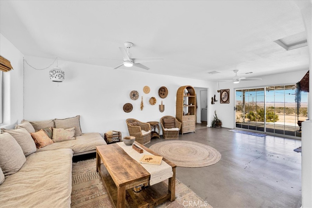 59700 Napa Road Landers, CA 92285 - Photo 10 of 68 a living room with furniture and a table