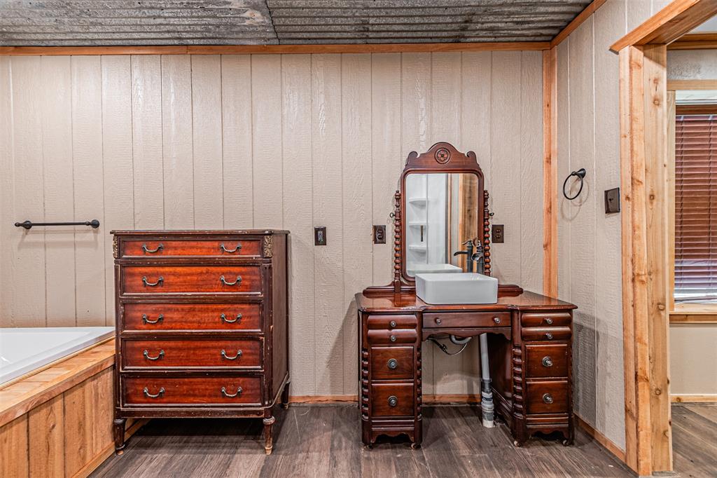 1398 Zagota Crossing Road Terrell, TX 75161 - Photo 19 of 40 a view of a bedroom with furniture and closet