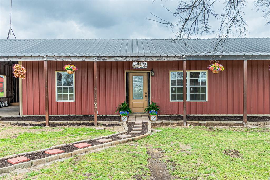 1398 Zagota Crossing Road Terrell, TX 75161 - Photo 2 of 40 a front view of a house with garden