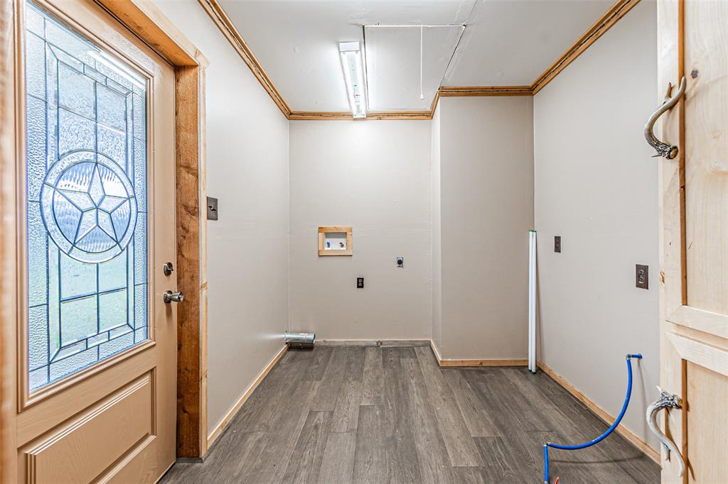 1398 Zagota Crossing Road Terrell, TX 75161 - Photo 26 of 40 a view of a hallway with wooden floor and entryway