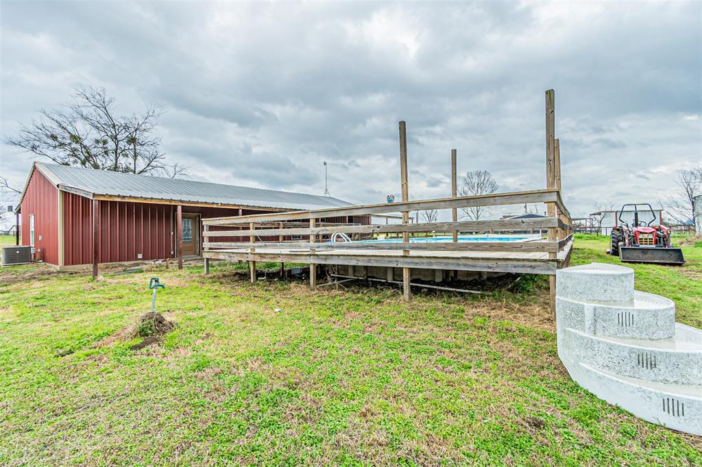 1398 Zagota Crossing Road Terrell, TX 75161 - Photo 31 of 40 a view of a lake with a big yard and large trees