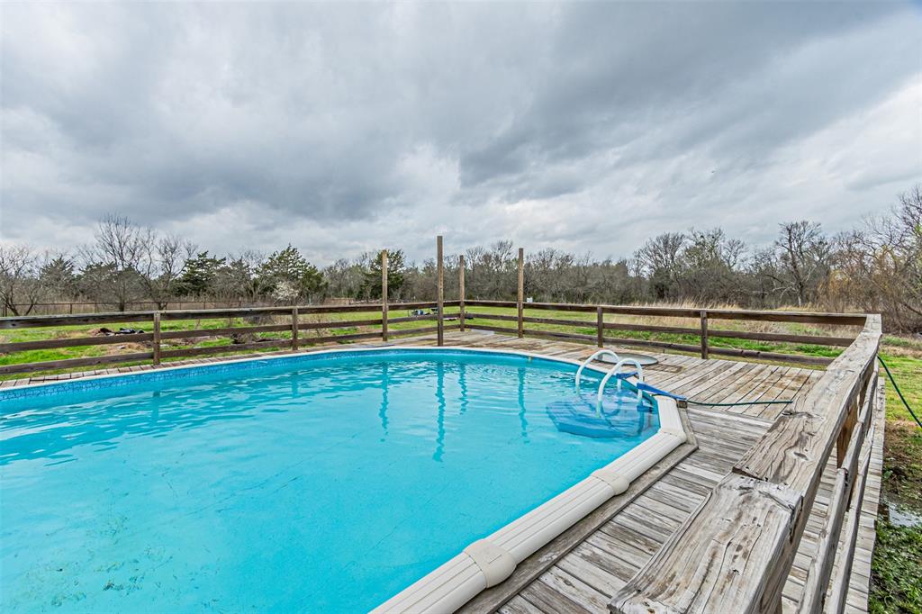 1398 Zagota Crossing Road Terrell, TX 75161 - Photo 35 of 40 a view of swimming pool with a yard and seating