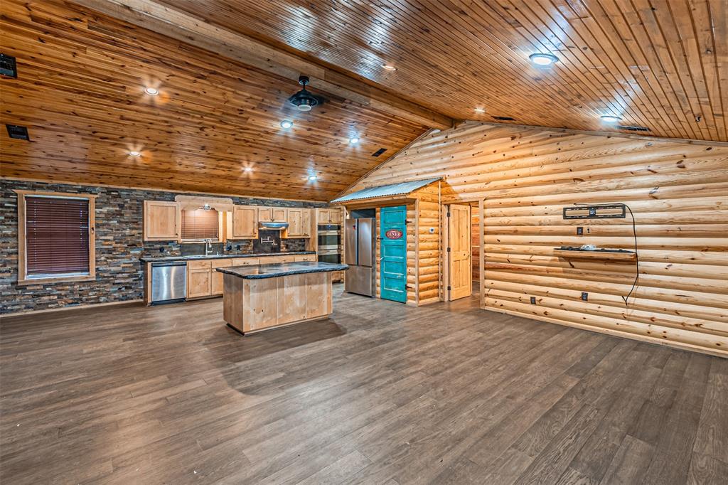 1398 Zagota Crossing Road Terrell, TX 75161 - Photo 5 of 40 a view of a room with wooden floor