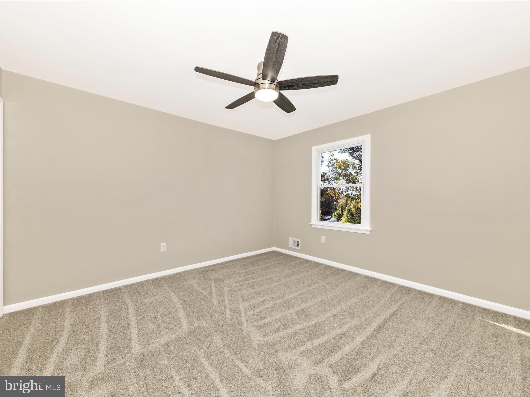 2431 Quebec School Road Middletown, MD 21769 - Photo 32 of 56 a view of an empty room with a window