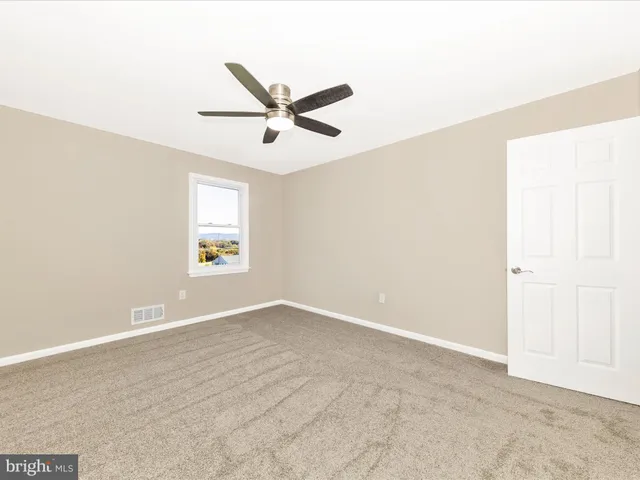 a bathroom with a sink a toilet and a bathtub