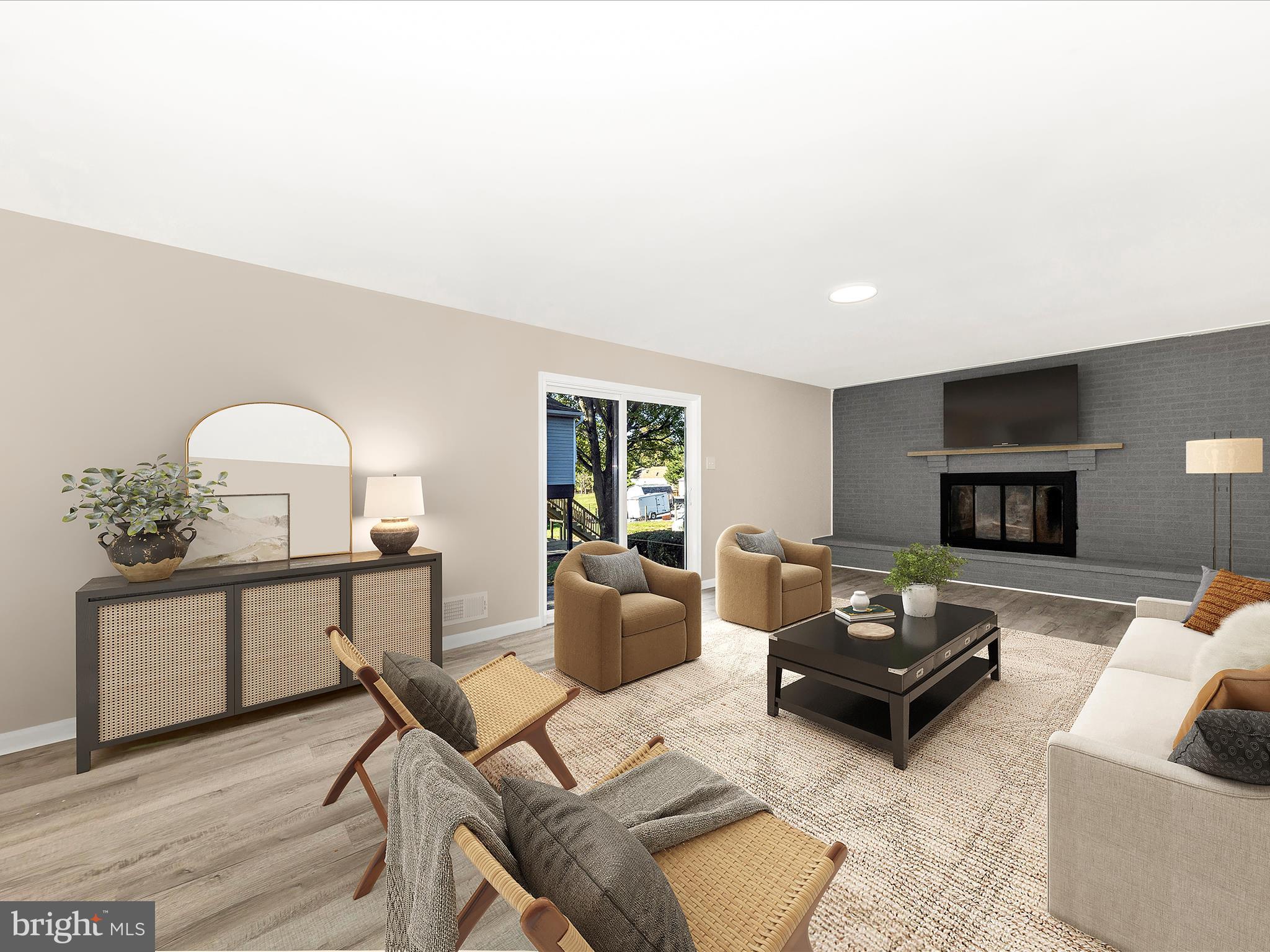 2431 Quebec School Road Middletown, MD 21769 - Photo 4 of 56 a living room with furniture a fireplace and a potted plant