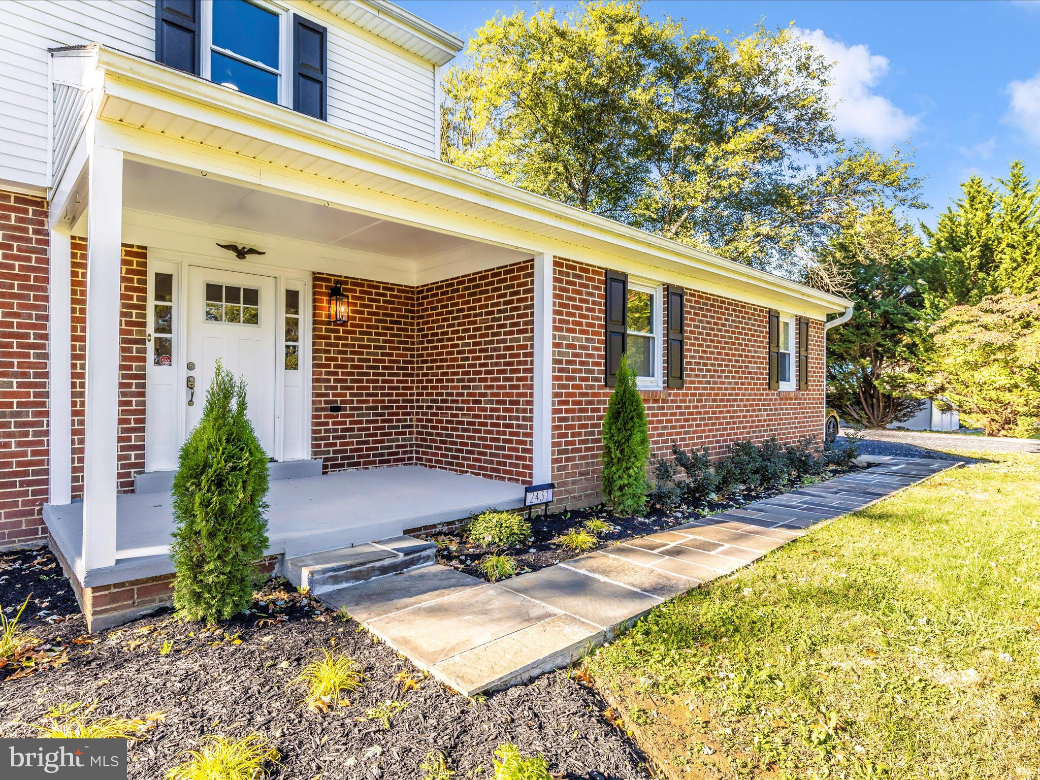 2431 Quebec School Road Middletown, MD 21769 - Photo 47 of 56 a front view of a house with garden