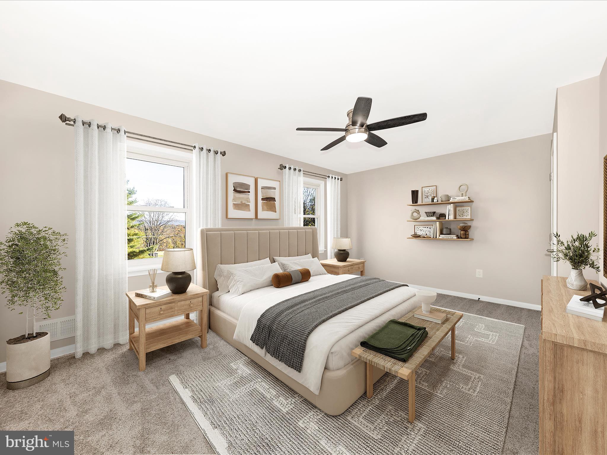 2431 Quebec School Road Middletown, MD 21769 - Photo 5 of 56 a bedroom with a large bed couch and a window