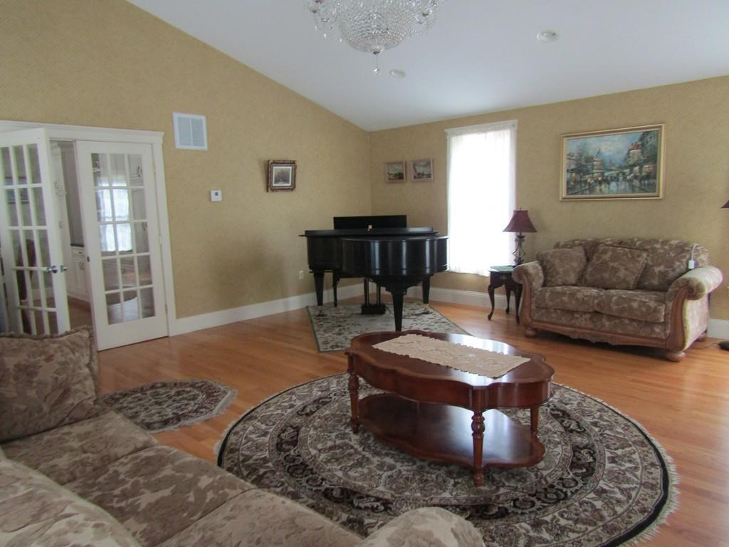 84 Ashburnham State Road Westminster, MA 01473 - Photo 8 of 14 a living room with furniture and a rug