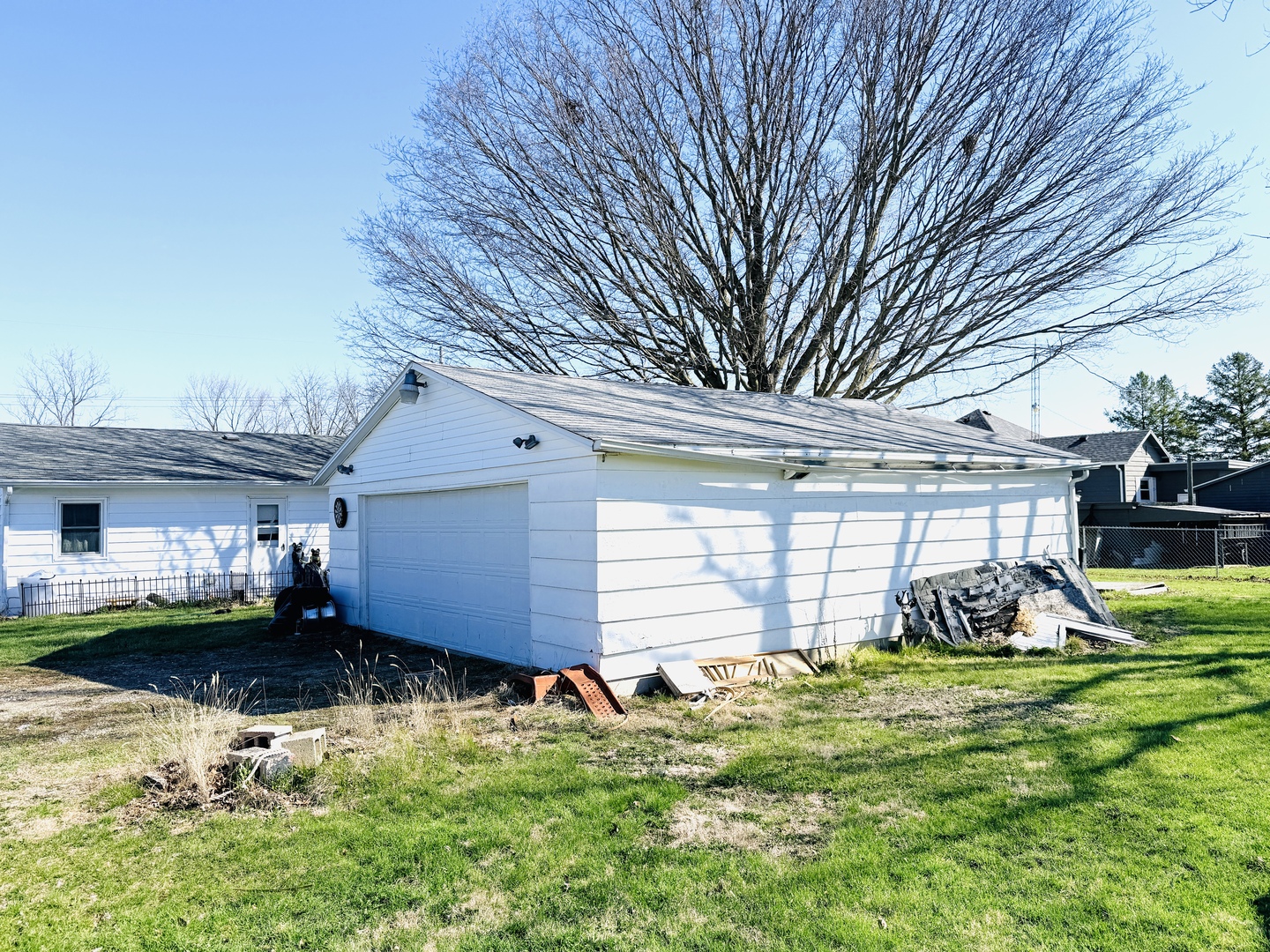570 1st N Street Wellington, IL 60973 - Photo 14 of 14 a view of a house with backyard and a tree