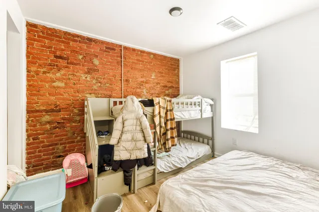 a bathroom with a toilet sink and a bathtub