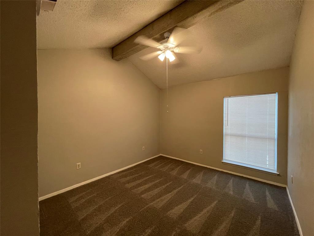 9696 Walnut Street, Unit 1413 Dallas, TX 75243 - Photo 8 of 17 an empty room with a empty space and a window