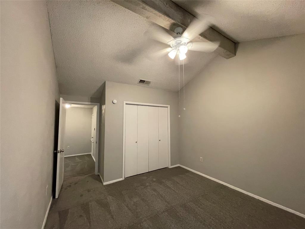 9696 Walnut Street, Unit 1413 Dallas, TX 75243 - Photo 9 of 17 an empty room with a bathroom