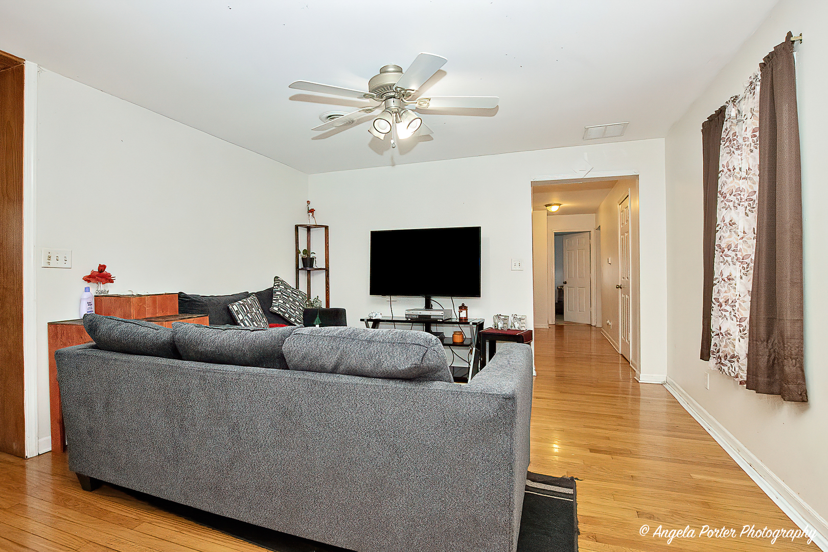 19212 Crowley Road Harvard, IL 60033 - Photo 14 of 38 a living room with furniture and a flat screen tv