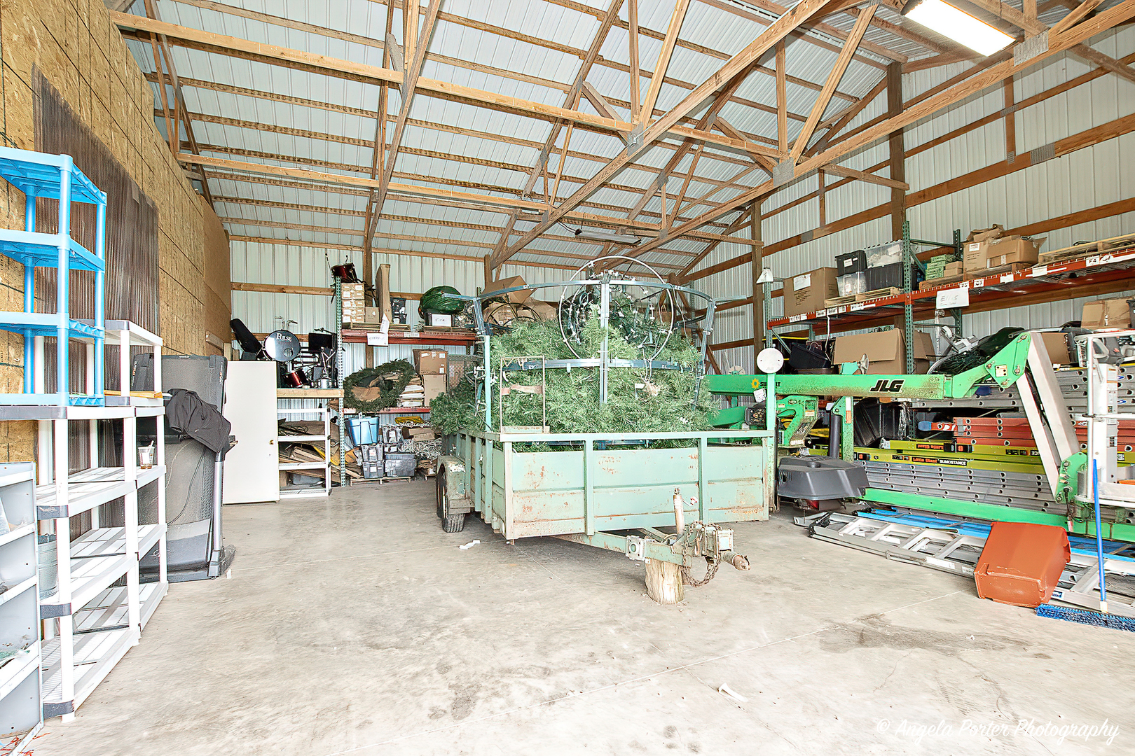 19212 Crowley Road Harvard, IL 60033 - Photo 29 of 38 a backyard of a building with barbeque oven table and chairs