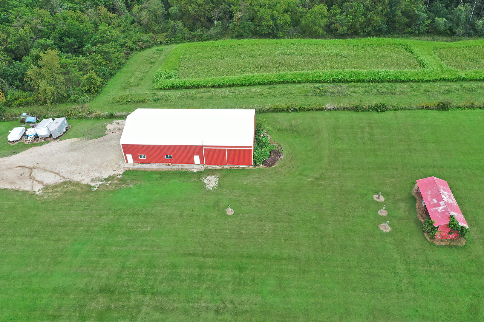 19212 Crowley Road Harvard, IL 60033 - Photo 35 of 38 a front view of a house with a yard and trees